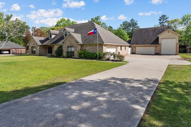 view of front of home featuring a garage and a front lawn