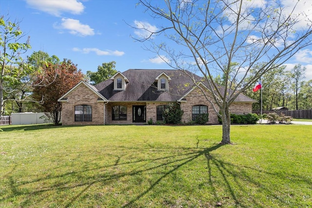 view of front of home with a front yard