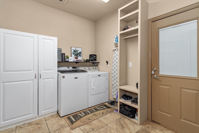 laundry area with washer and clothes dryer