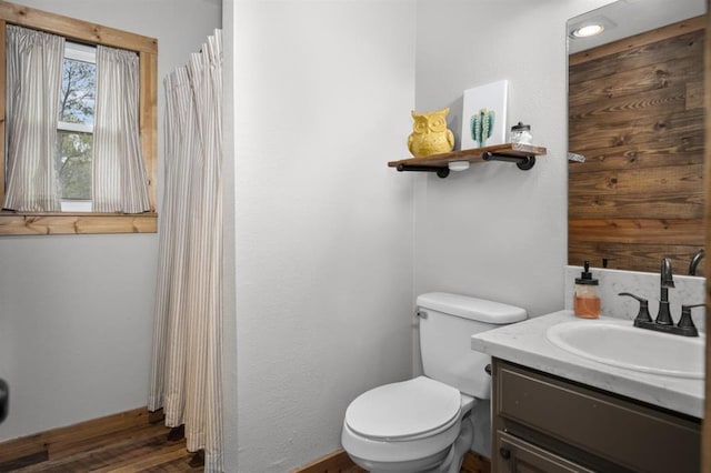 3535 Fm 1007, Brookeland, TX 75931 - bathroom featuring vanity, toilet, and wood finished floors