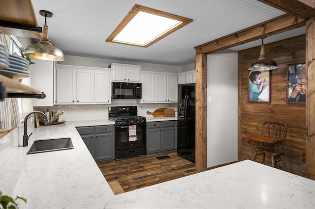 3535 Fm 1007, Brookeland, TX 75931 - kitchen with black appliances, a sink, gray cabinetry, backsplash, and dark wood-style flooring