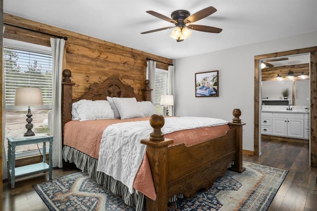3535 Fm 1007, Brookeland, TX 75931 - bedroom with a sink, multiple windows, dark wood-type flooring, and a ceiling fan