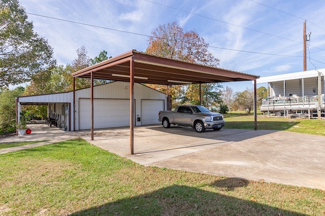 view of vehicle parking featuring a detached garage