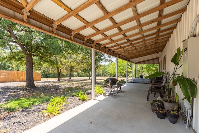 view of patio featuring fence