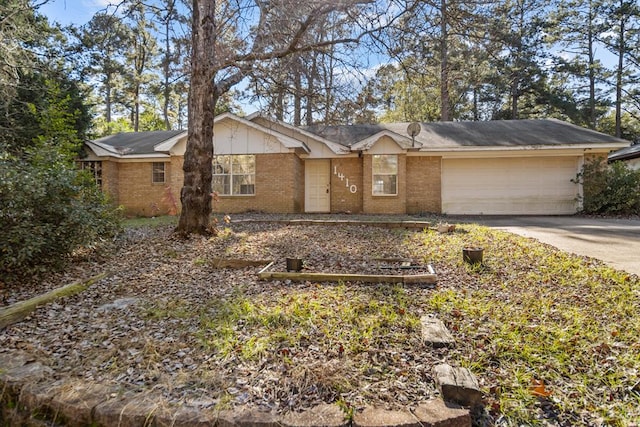 ranch-style house featuring a garage