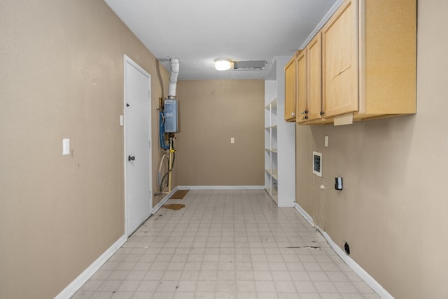 laundry room featuring cabinets and washer hookup