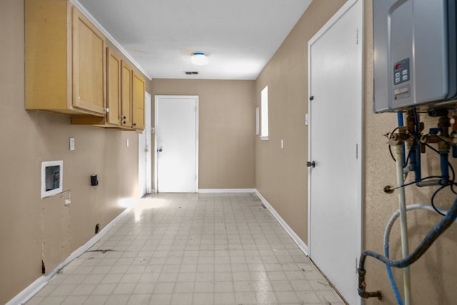 laundry area with hookup for an electric dryer, hookup for a washing machine, cabinets, water heater, and hookup for a gas dryer