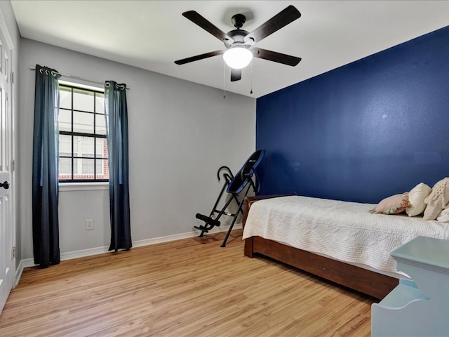 602 April Dr, Lufkin, TX 75904 - bedroom featuring wood finished floors and ceiling fan