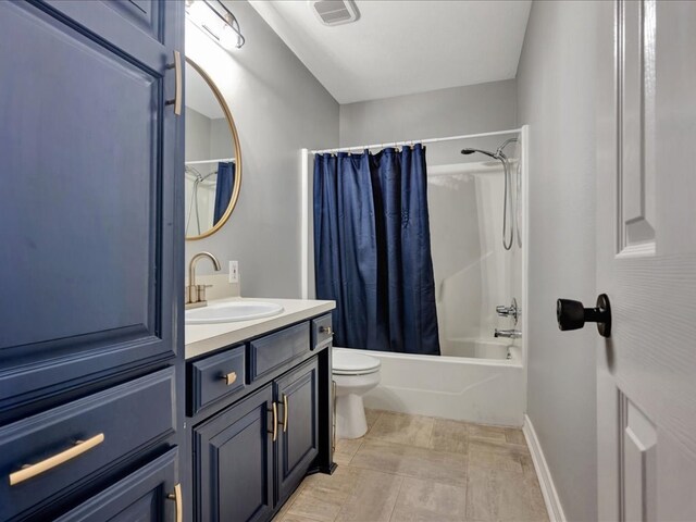 602 April Dr, Lufkin, TX 75904 - bathroom with vanity and shower / bath combo with shower curtain