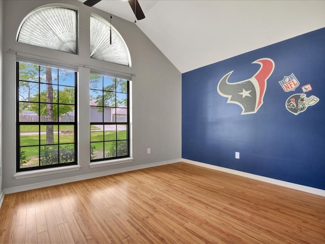 602 April Dr, Lufkin, TX 75904 - unfurnished room featuring ceiling fan, wood finished floors, and lofted ceiling