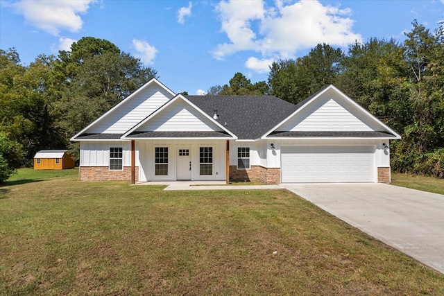 craftsman inspired home with a porch, a garage, and a front lawn