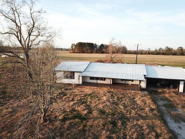 view of dock with a rural view