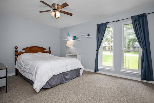 1504 Azalea Dr, Lufkin, TX 75904 - bedroom featuring carpet flooring, baseboards, and ceiling fan