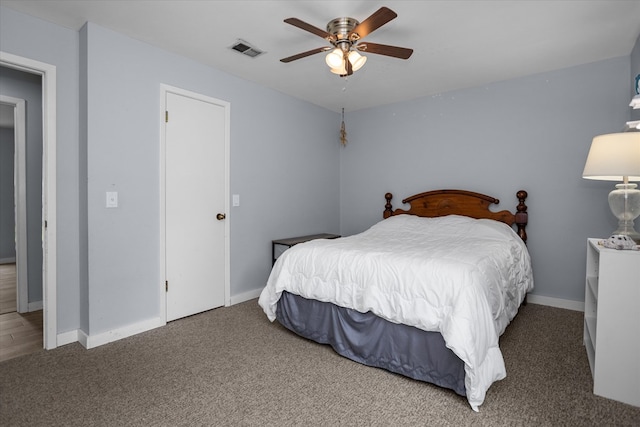 1504 Azalea Dr, Lufkin, TX 75904 - carpeted bedroom with baseboards and ceiling fan
