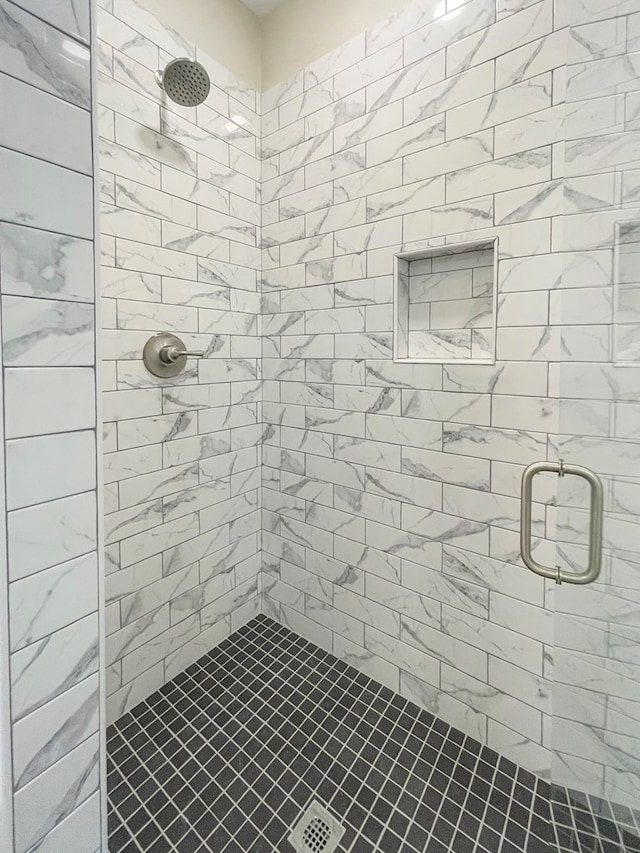 bathroom with a stall shower
