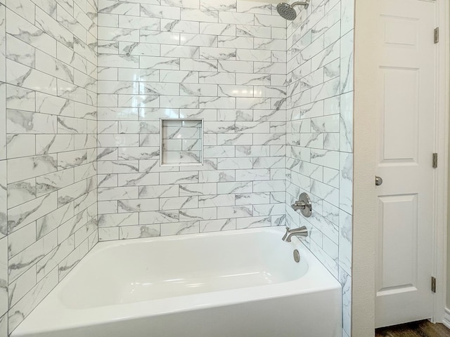 bathroom featuring shower / washtub combination