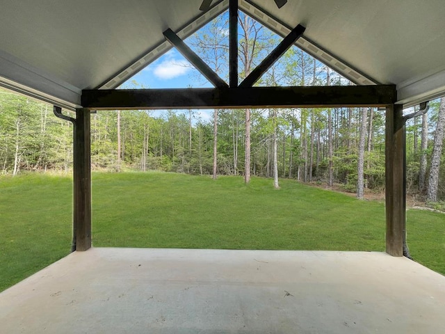 view of patio featuring a view of trees