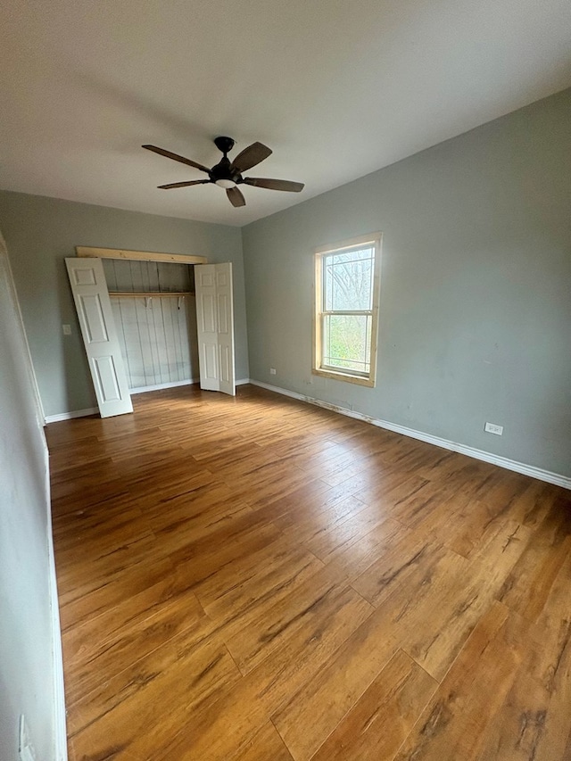 interior space with ceiling fan, a closet, and light wood-type flooring