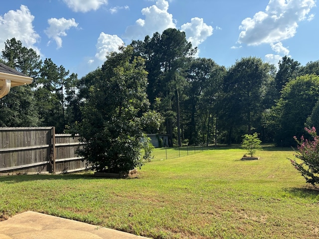 view of yard featuring fence