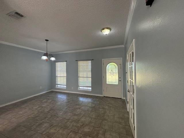 foyer featuring ornamental molding, a chandelier, and a textured ceiling