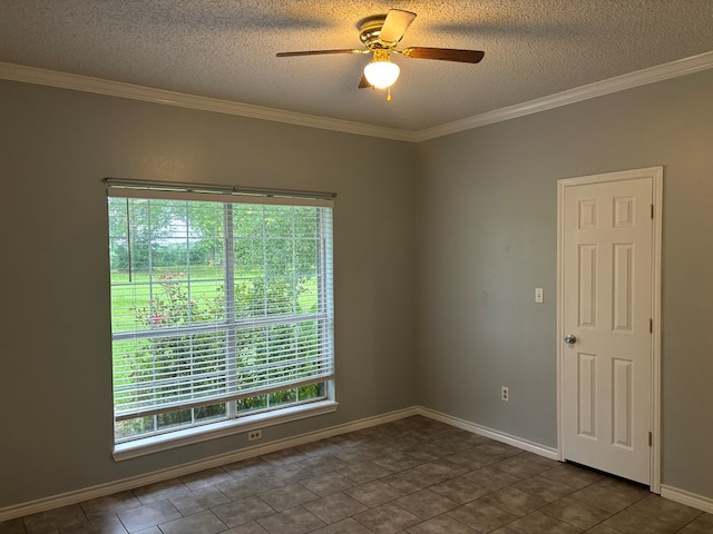 unfurnished room featuring a textured ceiling, ceiling fan, ornamental molding, and baseboards