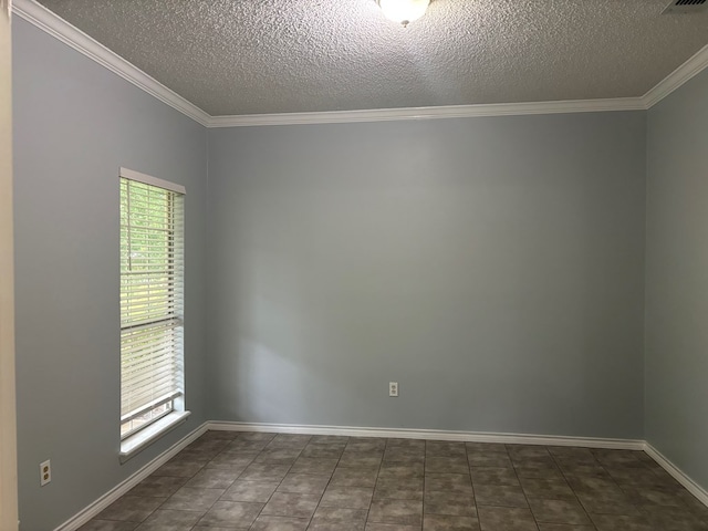 spare room featuring baseboards, a textured ceiling, visible vents, and crown molding