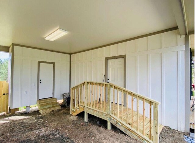 garage with a decorative wall