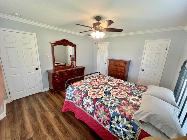 bedroom with ceiling fan, dark hardwood / wood-style floors, and ornamental molding