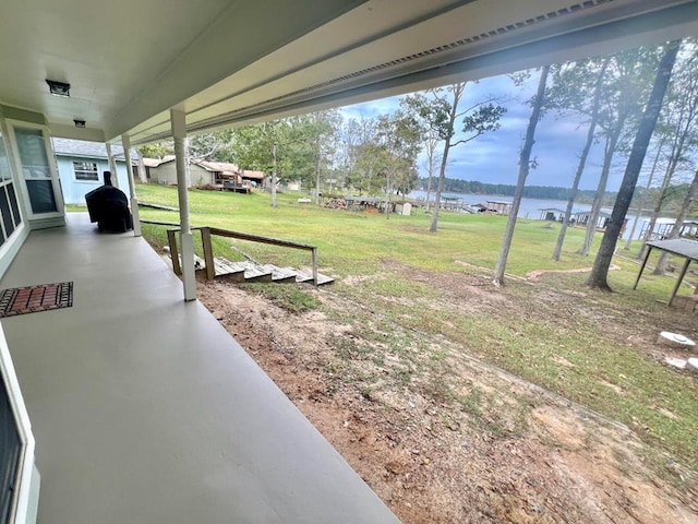 view of yard with a water view