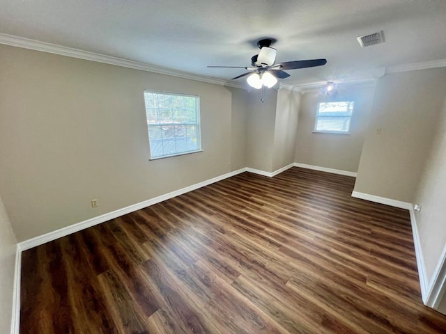 unfurnished room with crown molding, ceiling fan, and dark hardwood / wood-style floors