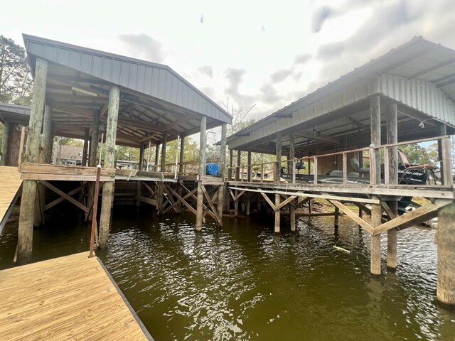 dock area with a water view