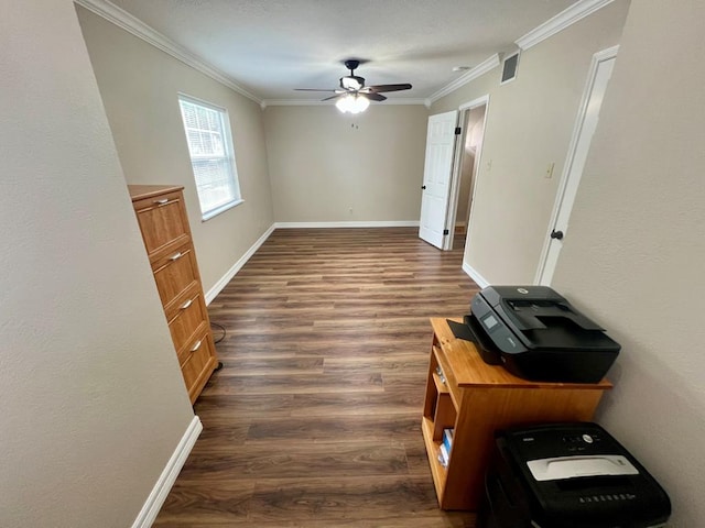 interior space with crown molding, dark hardwood / wood-style flooring, and ceiling fan