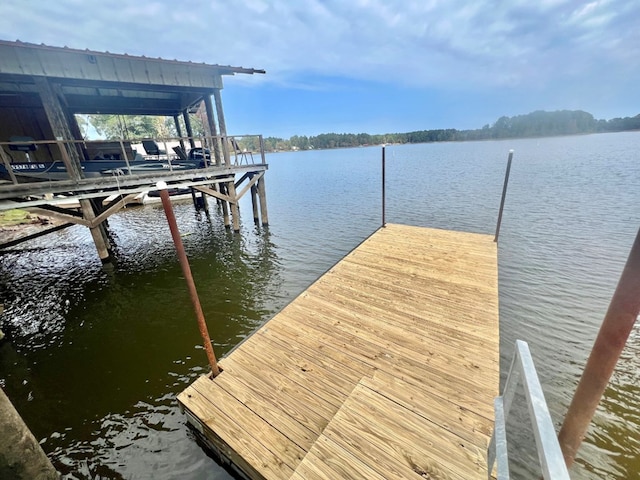 dock area featuring a water view