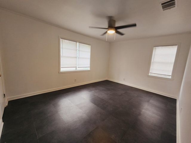 unfurnished room featuring ceiling fan