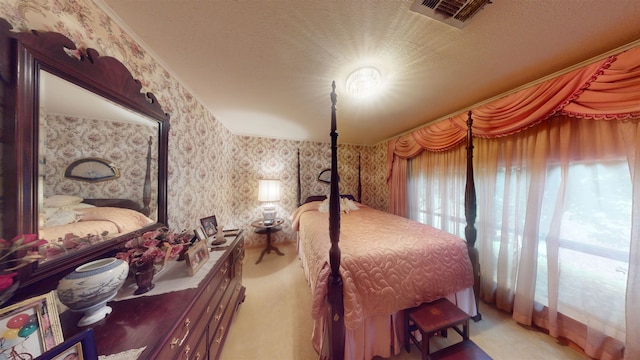 carpeted bedroom with a textured ceiling