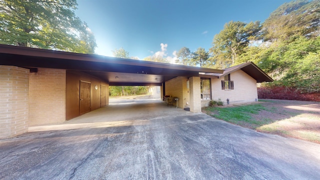 view of front of home with a carport