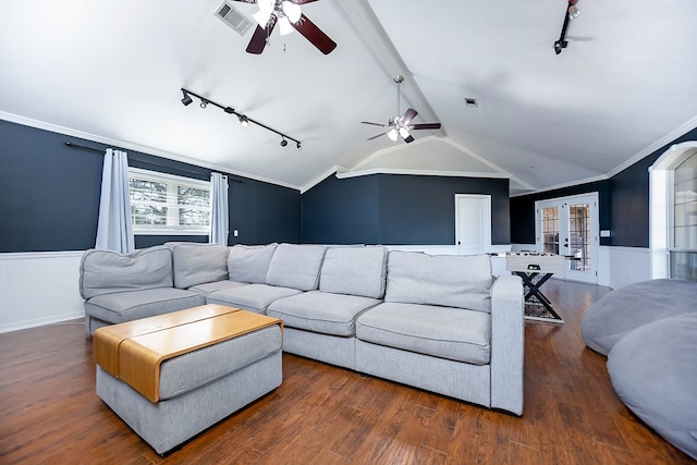 living room featuring ornamental molding, dark wood-type flooring, lofted ceiling with beams, and ceiling fan