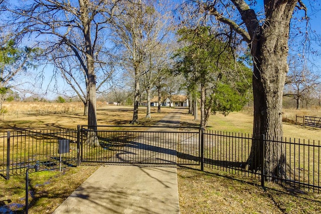 view of gate featuring a rural view