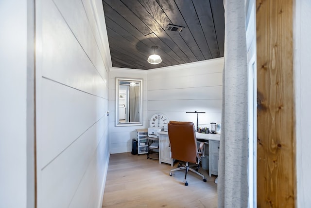 home office with wood ceiling and light hardwood / wood-style floors