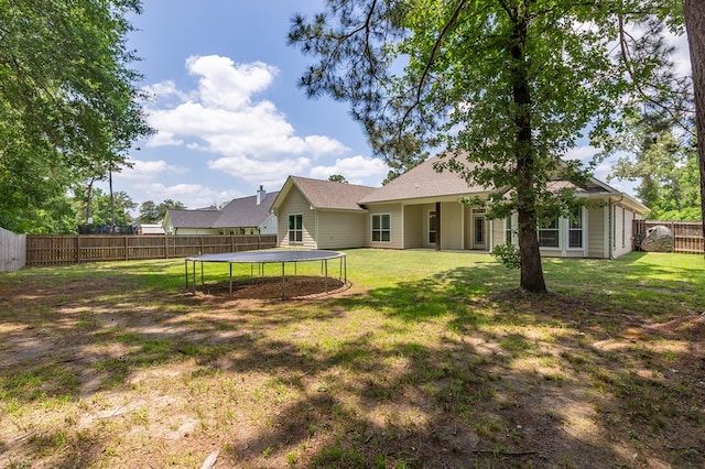 181 Rustic Pines Dr, Lufkin, TX 75904 - back of house with a trampoline
