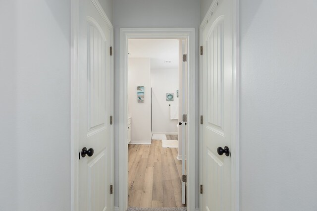 181 Rustic Pines Dr, Lufkin, TX 75904 - corridor featuring light wood-style floors and baseboards