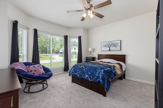 181 Rustic Pines Dr, Lufkin, TX 75904 - carpeted bedroom featuring baseboards and a ceiling fan