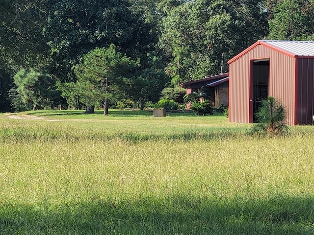 339 Liles Ln, Hudson, TX 75904 - view of yard featuring an outdoor structure