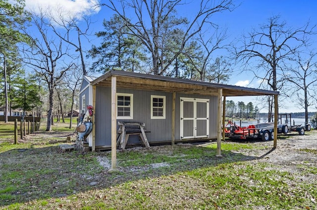 view of outbuilding featuring an outdoor structure