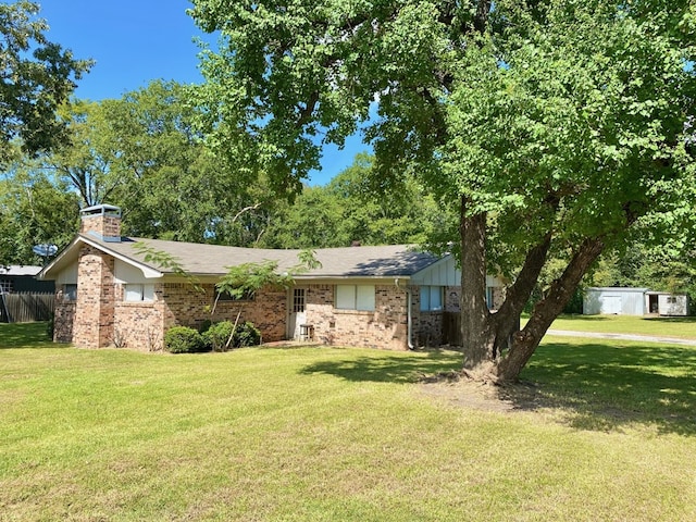 single story home with a front yard