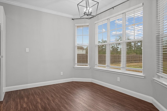 unfurnished room featuring baseboards, dark wood-style floors, and crown molding