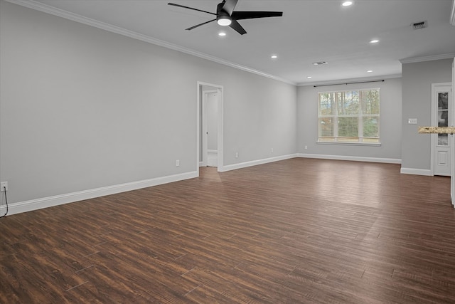 unfurnished living room with dark wood finished floors, recessed lighting, crown molding, and baseboards