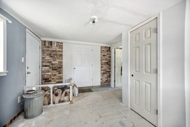277 Mcclendon Rd, Lufkin, TX 75904 - foyer entrance with brick wall