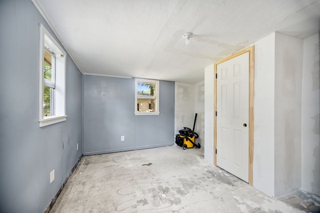 277 Mcclendon Rd, Lufkin, TX 75904 - below grade area with plenty of natural light and a textured ceiling