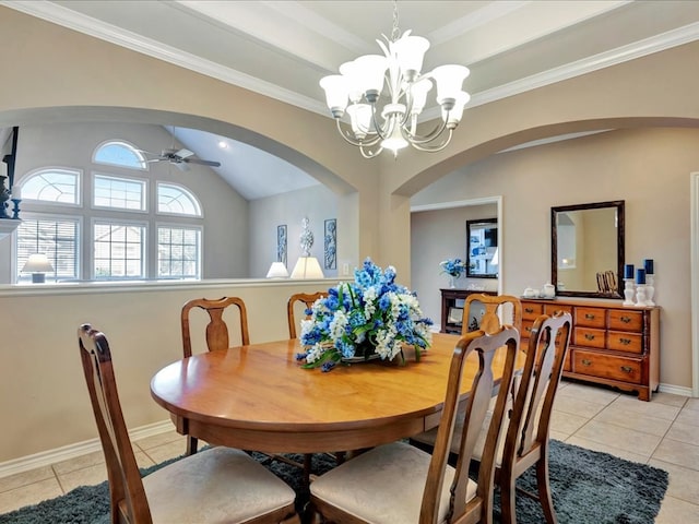 dining space with ceiling fan with notable chandelier, light tile patterned flooring, lofted ceiling, and crown molding